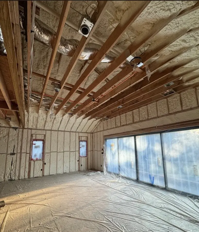 Interior walls and ceiling insulated with spray foam during new construction in Homer Glen
